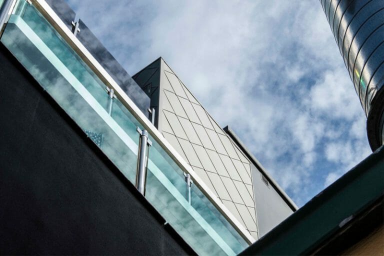 Bridge Road Apartments features Standing Seam and Shingles by Metal