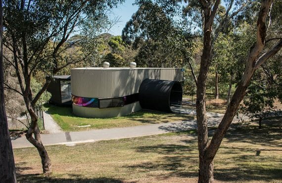 Snaplock (38mm) rolled on site cladding in COLORBOND® Steel Metallic Steel Rhea™ at Biological Science Lab, Melbourne