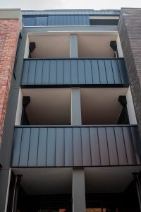 Nailstrip cladding in Colorbond Steel, Metallic Rhea, Metallic Astro and Metallic Celestian at MADE Apartments, Richmond,...